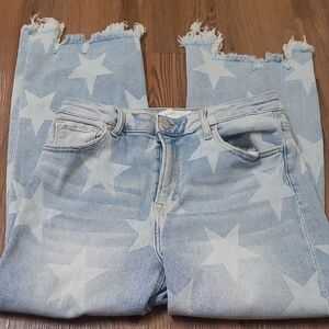 RISEN JEANS .Women’s Light Blue Star-Print Cropped Jeans